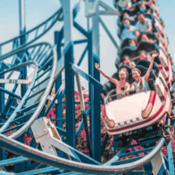 A group of people going down a roller coaster. roller coasters cause brain injuries, Six Flags X2 injuries